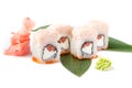 Refined sushi rolls with salmon, Philadelphia cheese and crab meat mousse. Isolated. Sushi roll on a white background.