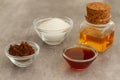 Refined white sugar , dark brown muscovado sugar, honey and agave syrup Royalty Free Stock Photo