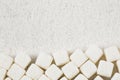 Refined white sugar powder and cubes. Wooden background Royalty Free Stock Photo