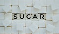 Refined white sugar with the word sugar Royalty Free Stock Photo