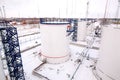 Refinery factory oil storage tanks under cloudy sky Royalty Free Stock Photo