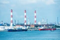 Refinery in the port of Singapore. Tanker ships berthed at the terminal.