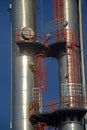 Refinery towers rise up into a bright clear blue sky,Victoria Australia.
