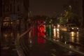 The reflecion of traffic and lights in the wet streets of london during night and illuminated