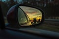 Reflected road in rearview mirror Royalty Free Stock Photo