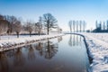 Reflected trees in a curved river Royalty Free Stock Photo