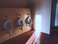 Reflected urinal in the men`s bathroom Royalty Free Stock Photo