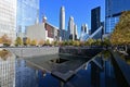 Reflecting pool and surrounding buildings at National September 11 Memorial. Royalty Free Stock Photo