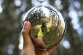 Reflecting sphere photographer selfie