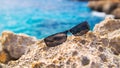 Reflecting in the sunglasses on the beach