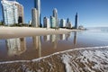 Reflection of apartments in ocean at sunrise, Gold Coast, Australia Royalty Free Stock Photo