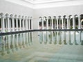 Reflection of arches in the water in the ablution area of the Sultan Omar Ali Saifuddin Mosque in Brunei Royalty Free Stock Photo