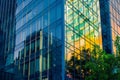 Reflection of architecture on modern office building, A glass wall of modern business office Royalty Free Stock Photo