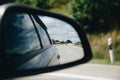 Reflection of highway at car side mirrow Royalty Free Stock Photo