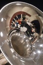 Reflection of auditorium marching band practice in a mellophone bell Royalty Free Stock Photo