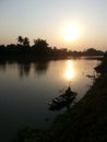 The reflection on the banks of the Tha Chin River