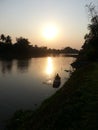 The reflection on the banks of the Tha Chin River