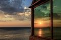 Reflection of beautiful sunset over the sea and colourful sky Royalty Free Stock Photo