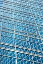 Reflection in blue glass wall of an modern office building Royalty Free Stock Photo