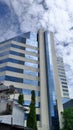 Reflection of blue sky in building window glass Royalty Free Stock Photo