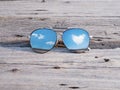 Reflection of blue sky and clouds heart shape in sunglasses Royalty Free Stock Photo