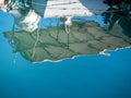 Reflection of a boat at jaffa port Royalty Free Stock Photo