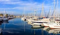 Reflection of boats laying in a marina at Larnaca, Cyprus. Blue sky and sea background. Royalty Free Stock Photo