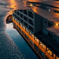 Reflection of a building in a puddle on a wet surface. The building appears modern with Royalty Free Stock Photo
