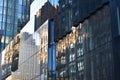 Reflection of buildings in windows of modern office building. Business concept Royalty Free Stock Photo