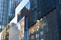 Reflection of buildings in the windows of a modern office building Royalty Free Stock Photo