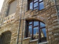 Reflection of the cathedral of the city of Leon (Leon) in the windows of neighboring houses