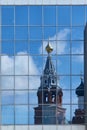 Reflection of the Church in mirrored glass on a modern building Royalty Free Stock Photo