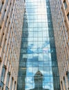 Reflection of the church dome in the windows of the modern business center White Square, view from the side of Zastavniy Pereulok