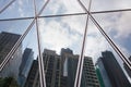 Reflection of city office building and sky background Royalty Free Stock Photo