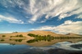 Reflection with clouds in a lake at Bruneau Sand Dunes State Par Royalty Free Stock Photo