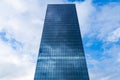 Reflection of clouds in a modern glass office building in the city Royalty Free Stock Photo