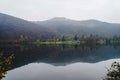 Reflection cloudy landscape Nature in autumn in Italy.