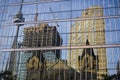 Reflection of cn tower and construction