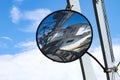 Reflection in curved mirror mounted on draw bridge in Mystic Conneticut Royalty Free Stock Photo