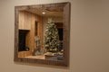 Christmas tree reflection from a hall mirror Royalty Free Stock Photo