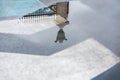 Reflection of Decorative historic metal fence in puddle after rain. Mysterious abstract, gate entrance in dreams Royalty Free Stock Photo