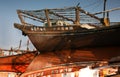 Reflection of dhow, a traditional fishing boat. The image has been roatated 180 degree to show the clear reflection on water Royalty Free Stock Photo