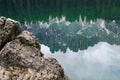 Reflection of the Dolomite Latemar Group in the Lake of Carezza Karersee, Trentino Alto Adige