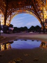 Reflection of the Eiffel Tower on a rainy Paris day