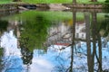 The Reflection of an Estate in a Lake