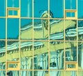 Reflection of the facade of a modern building in a glass window Royalty Free Stock Photo