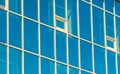 Reflection of the facade of a modern building in a glass window Royalty Free Stock Photo