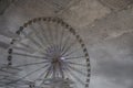 Reflection of a Ferris Wheel in Puddle on Sidewalk of Paris, France Royalty Free Stock Photo