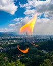 The reflection of fire in the glass with the cityscape of Taipei, Taiwan in the background Royalty Free Stock Photo