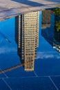 Reflection of First National Bank of Omaha skyscraper on Gene Leahy Mall at The Riverfront Downtown, Omaha Nebraska USA.